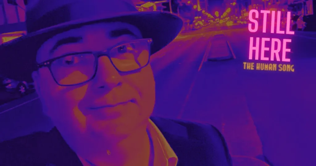 Still Here (The Human Song), lyrics by Steve Davis, performance by Steve Davis & The Virtualosos