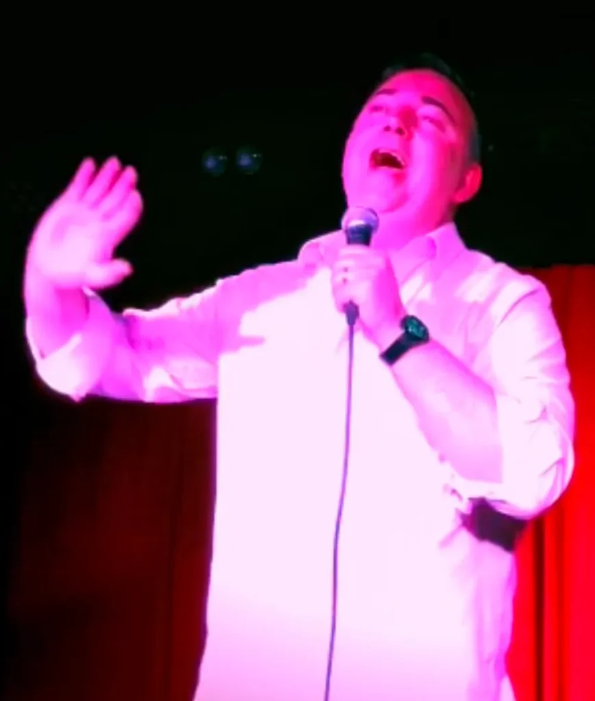 Steve Davis singing on stage
